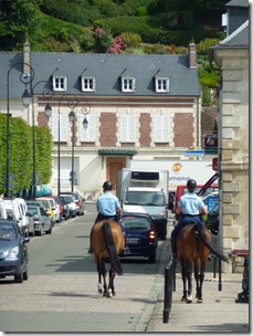 Street in Pierrefonds with horse patrols