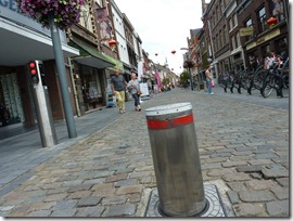 Pole barriers rise up to create pedestrian walks on city streets