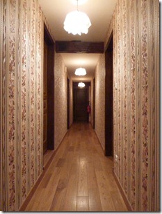 Flowered wallpapered hallway