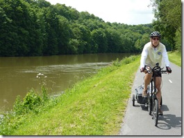 Steve biking north on the Meuse