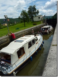 River boats going through a lock