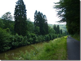 Bike trail on side channel through forest