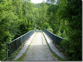 Cobblestone bridge over Meuse