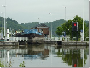 Large barge coming out of lock