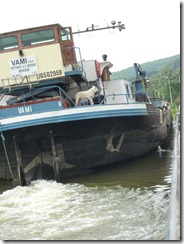 Barge in lock with only inches to spare