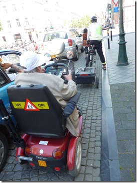 Handicap scooters share road