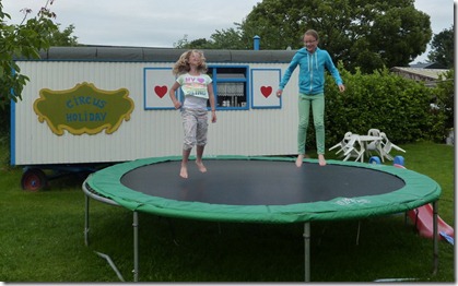 Kids in the gypsy camp and their Circus Holiday caravan