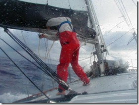 Steve on deck in storm aboard s/v Ariel