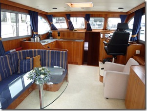 Main saloon of OK with helm inside