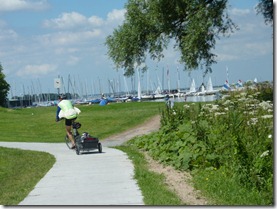 Steve rounding bike trail outside Naarden